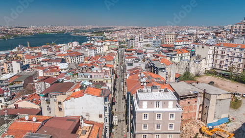 The view from Galata Tower to Golden Horn and city skyline with red roofs timelapse, Istanbul, Turkey © neiezhmakov