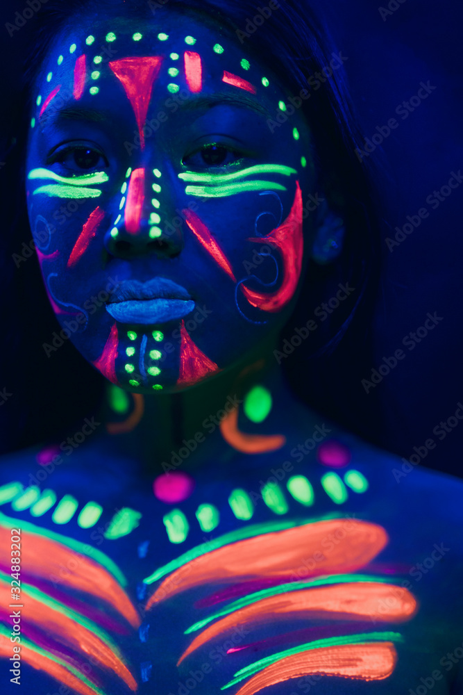 Front view of woman with fluorescent make-up Front view of woman with fluorescent make-up