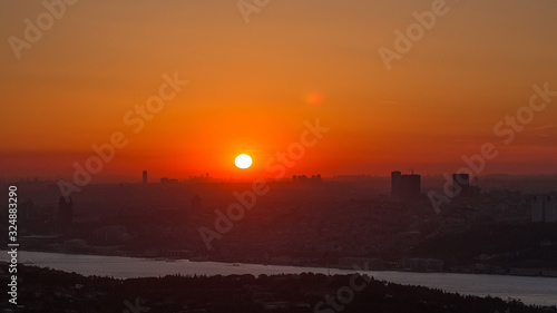 Colorful sunset on Bosphorus timelapse from Camlica hill with city skyline in Istanbul.