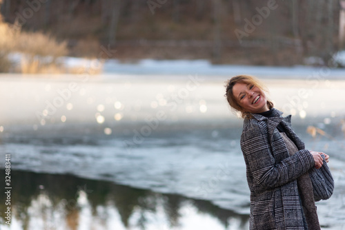 a beautiful blond woman in the woodland