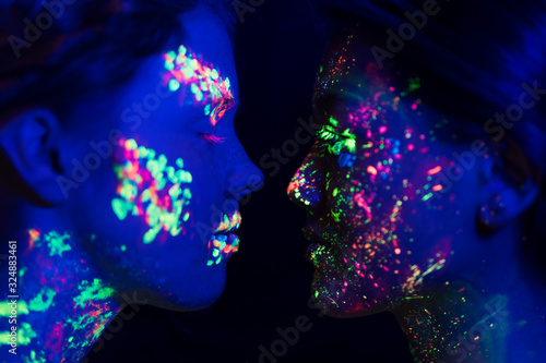 Close-up view of colorful fluorescent make-up