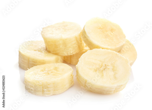 Ripe .banana slices isolated on white background.