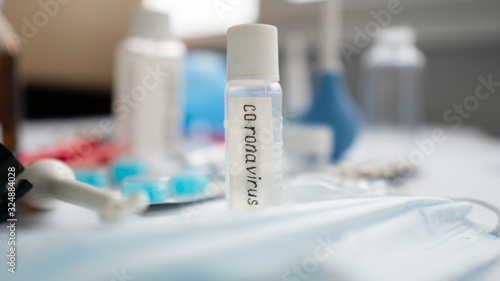 Coronavirus outbreak concept.Coronavirus diagnosis  laboratory testing to find and stop the spread of Wuhan coronavirus. Disease outbreak during the flu season. Protective medicines  pills  mask 