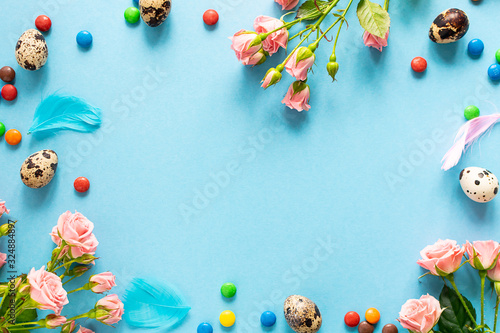 Happy Easter greeting card on trendy blue background with copy space for your text.
