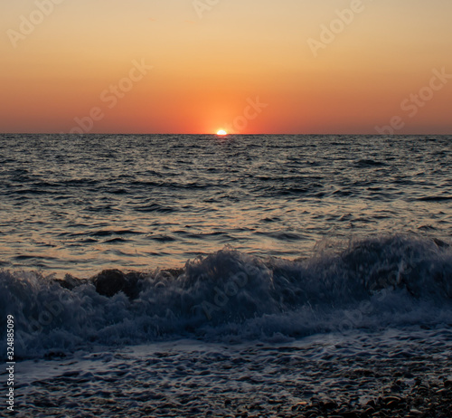 Sunset on the Black Sea in Sochi on a summer hot day