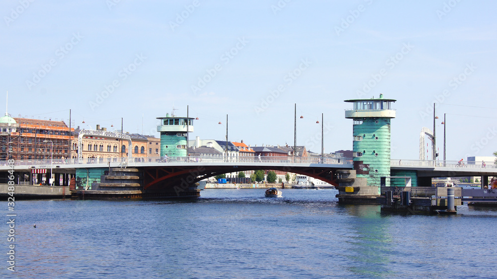 COPENHAGEN, DENMARK - JUL 06th, 2015: Knippelsbro drawbridge across the inner harbour of Copenhagen, with two control towers
