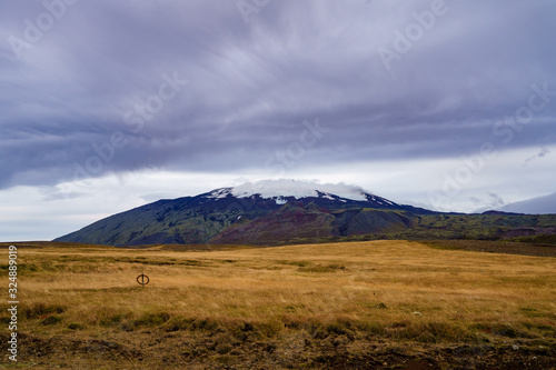 Snow mountain range under the ominous clouds -- Iceland 