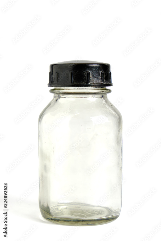 Old, empty bottle of medicine on a white background. Old, empty bottle of medicine on a white background.