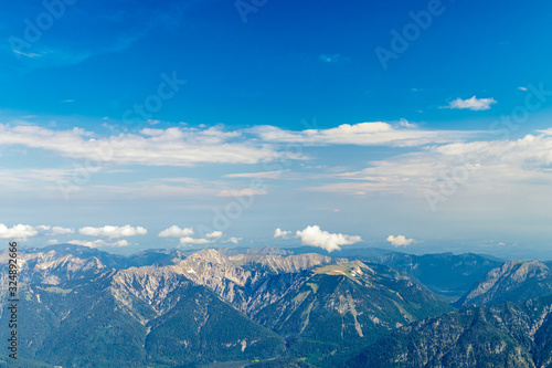 Panoramic view of the European Alps from the top of Zugspitze on a sunny summer day © Gaschwald