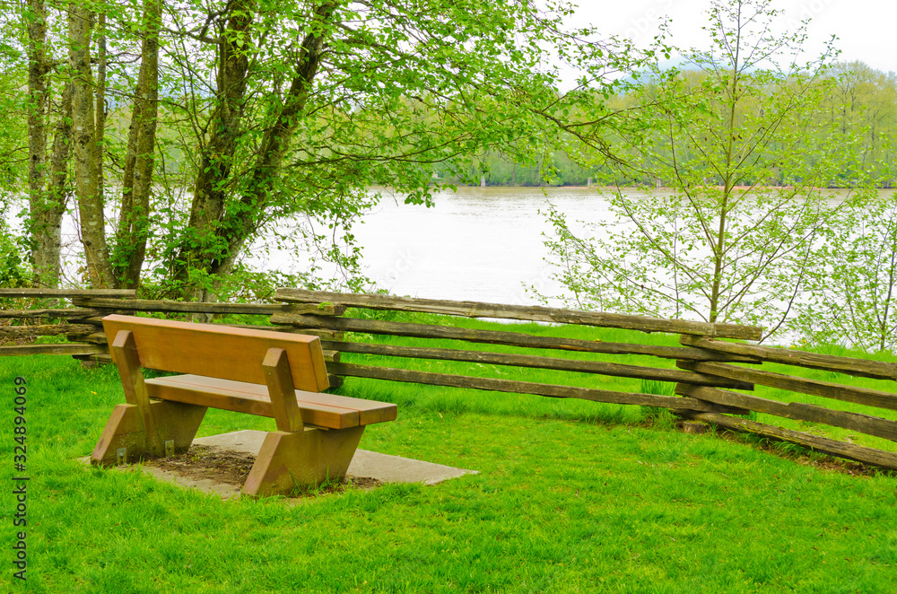 A picnic bench with gorgeous river view at Derby Reach Regional Park, British Columbia, Canada.