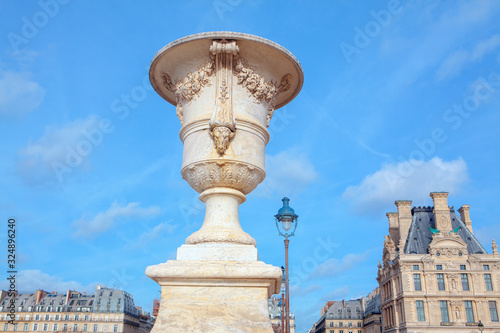 white stone flower pot on parisian street  © russieseo