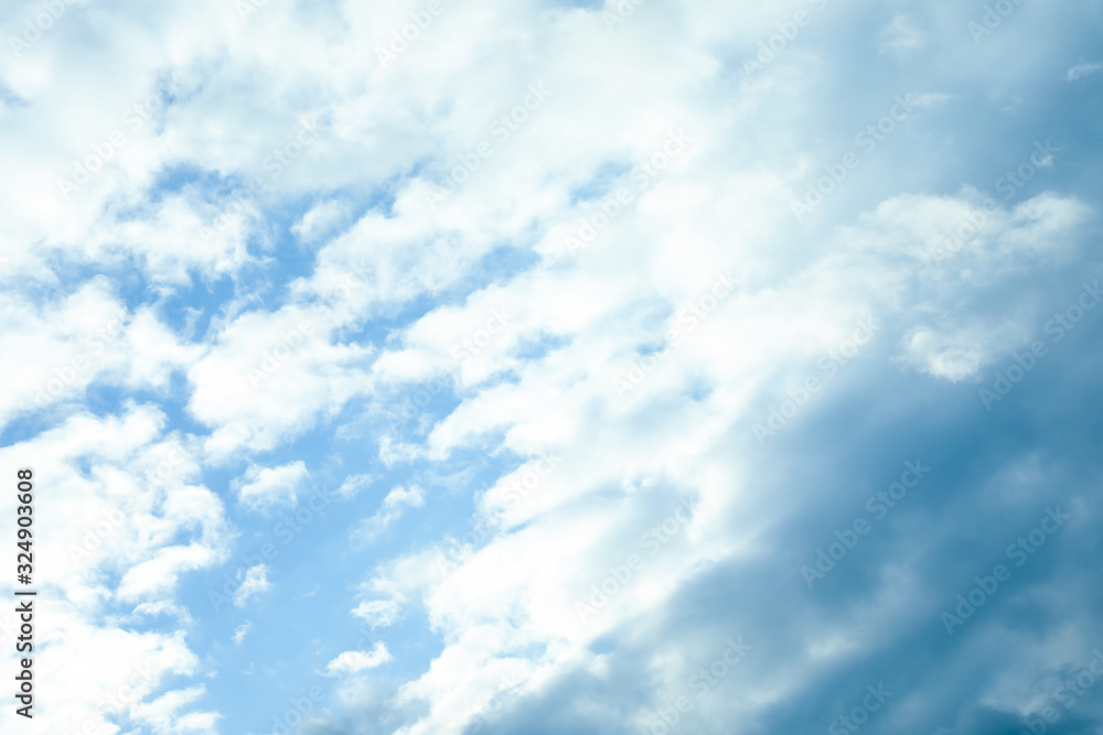 Obraz premium Beautiful blue sky with clouds on sunny day