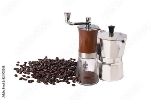Moka pot and Coffee bean grinder with Roasted coffee beans isolated on white background.