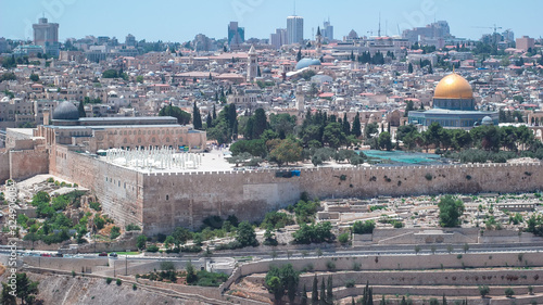 Panoramic view on Jerusalem timelapse with the Dome of the Rock from the Mount of Olives. photo