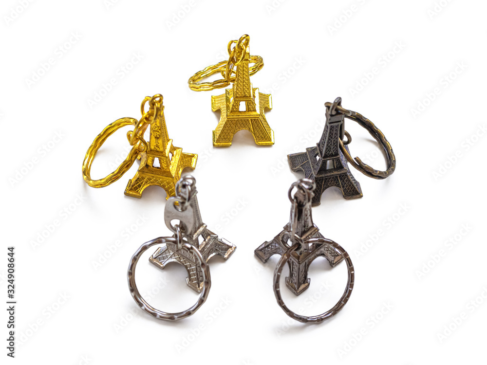 Top view of the small souvenir Eiffel towers on a white background Top view of the small souvenir Eiffel towers on a white background