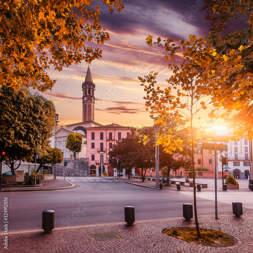 Incredible evening scene in Lecco town on Como lake, during sunset. Amazing colorful cityscape under bright sunlight. Best popular placec for travel. wonderful Autumn nature scenery. Beauty in world.