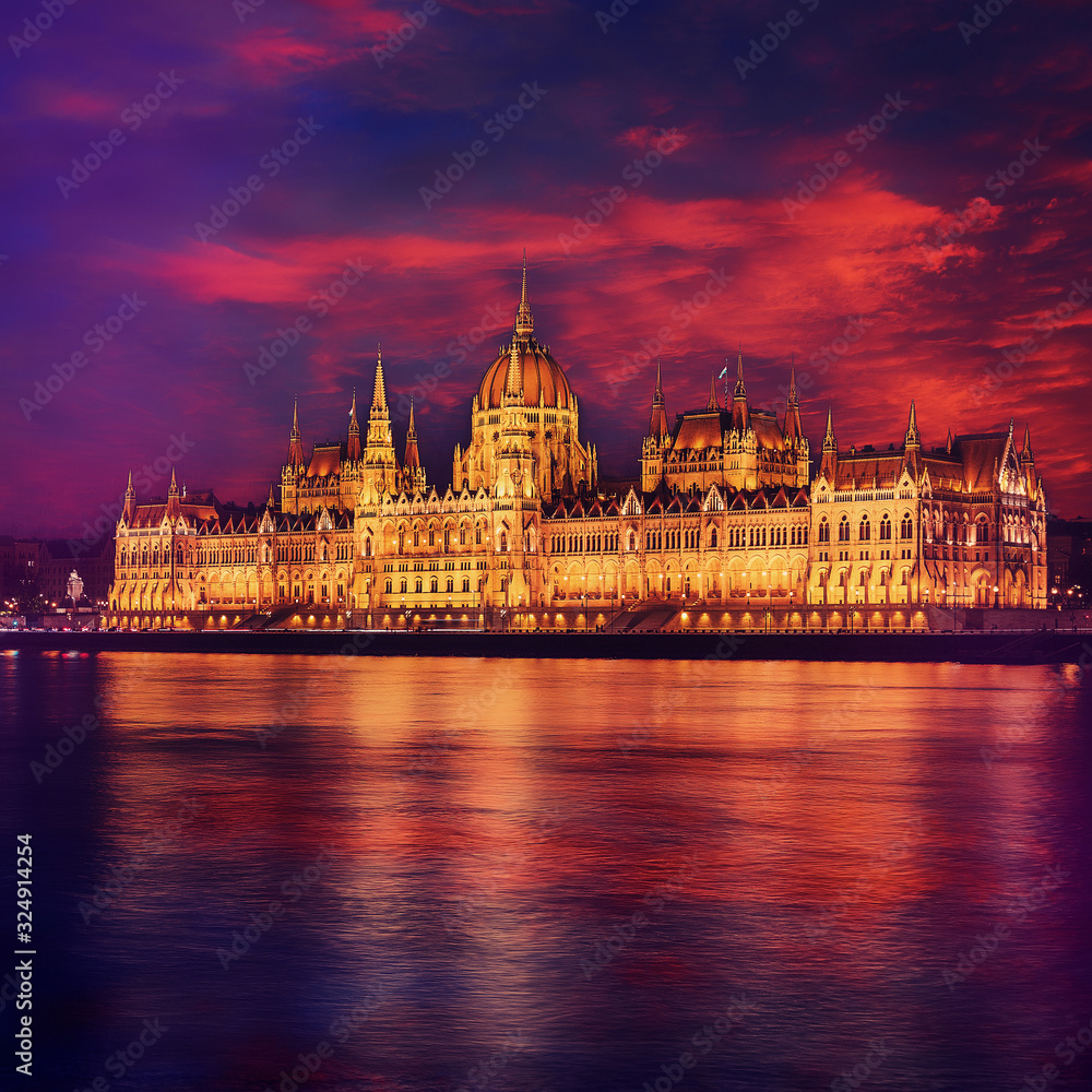 Incredible Evening View of Budapest parliament at sunset, Hungary. Wonderful Cityscape with Colorful sky. Popular travel destination and best place for photographers. Instagram Style. Creative image