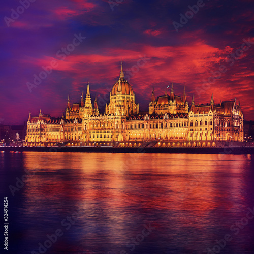 Incredible Evening View of Budapest parliament at sunset, Hungary. Wonderful Cityscape with Colorful sky. Popular travel destination and best place for photographers. Instagram Style. Creative image