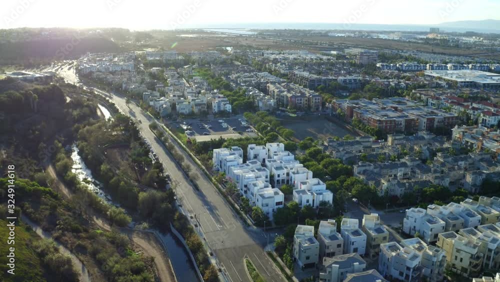 Tilt down aerial, sun shines over apartments in Playa Vista Tilt down aerial, sun shines over apartments in Playa Vista
