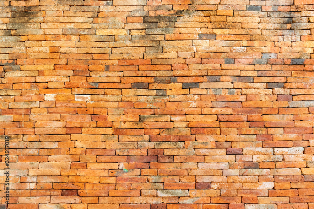 Fototapeta premium Beautiful brick walls that are not plastered background and texture. Background of old vintage brick walls.