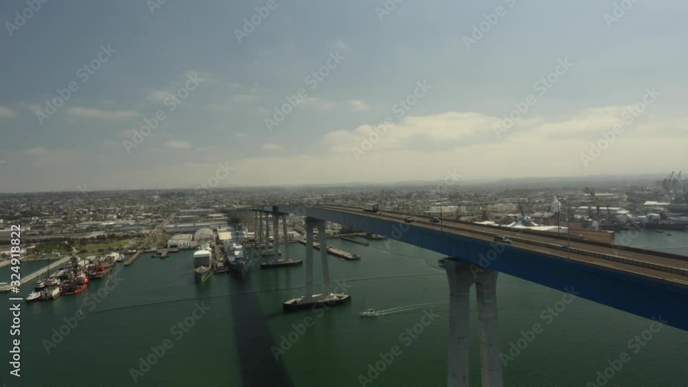 Cars drive on Coronado Bridge in San Diego Bay, wide aerial Cars drive on Coronado Bridge in San Diego Bay, wide aerial