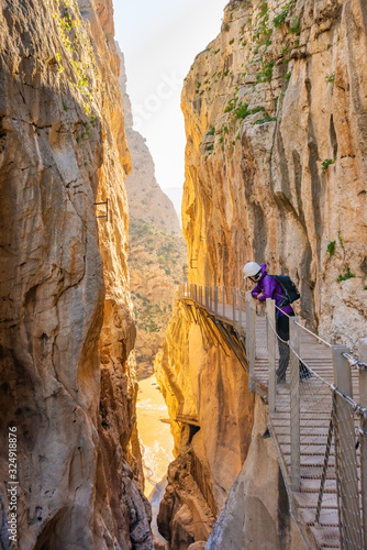 tourist woman in El Caminito del Rey or King's Little Path, one of the most Dangerous Footpath reopened 2015 Malaga, Spain
