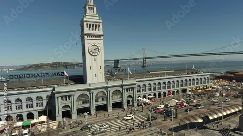 People walk into San Francisco Ferry Building, wide aerial