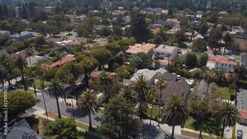 Panning aerial, suburban neighborhood in Santa Monica