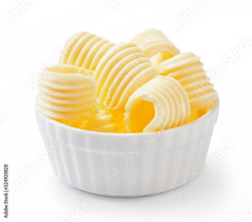 Fotografía Butter curls or butter rolls in white bowl isolated on white background