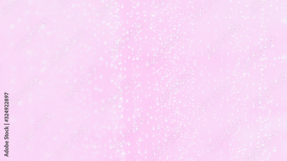 Pale pink blurred background with water drops pattern,16:9 panoramic format