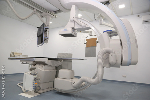 Angio lab in a hospital with diagnostic imaging equipment used to visualize the arteries and the chambers of the heart