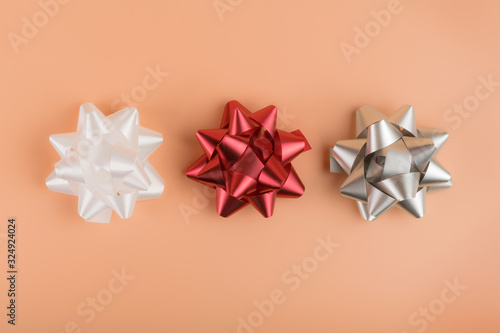 Three foil decorative bows ...
