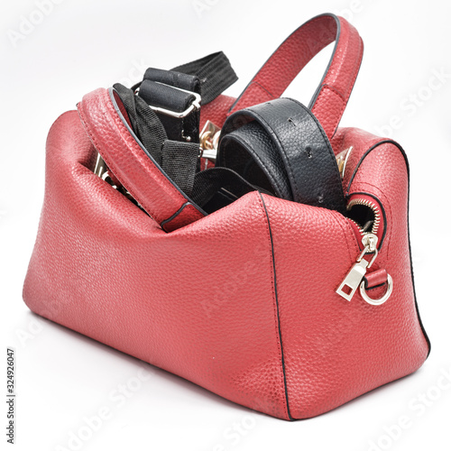 a lady's purse filled with all sorts of things