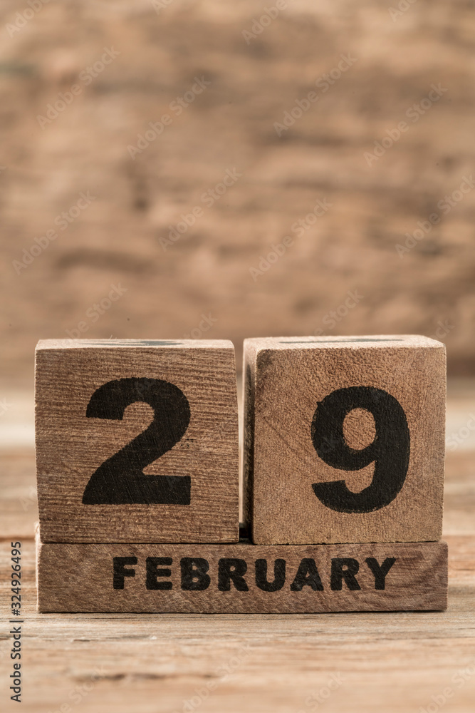 cube calendar for february on wooden background with copy space cube calendar for february on wooden background with copy space