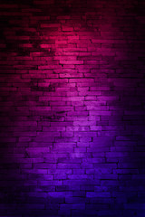 Neon light on brick walls that are not plastered background and texture. Lighting effect red and blue neon background of empty brick basement wall.