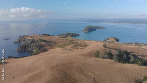 Aerial: Fly-over beautiful Slipper Island photo