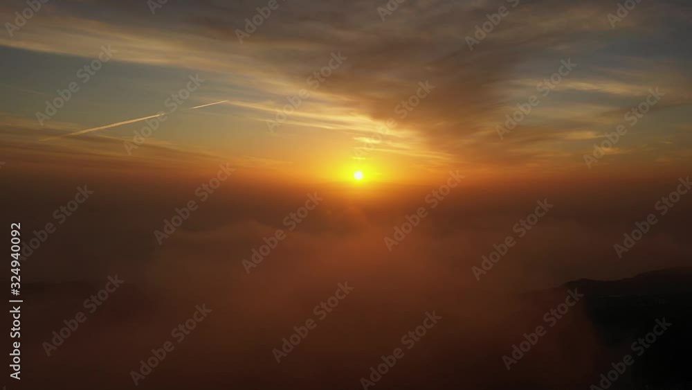 beautiful bright orange sunset on the Canary Islands.sun in clouds at sunset.Aerial view,Santa Cruz de Tenerife. beautiful bright orange sunset on the Canary Islands.sun in clouds at sunset.Aerial view,Santa Cruz de Tenerife.