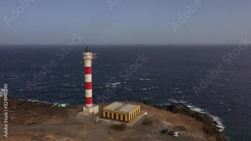 Lighthouse on the shore of the Atlantic Ocean. Aerial view. Canary Islands.