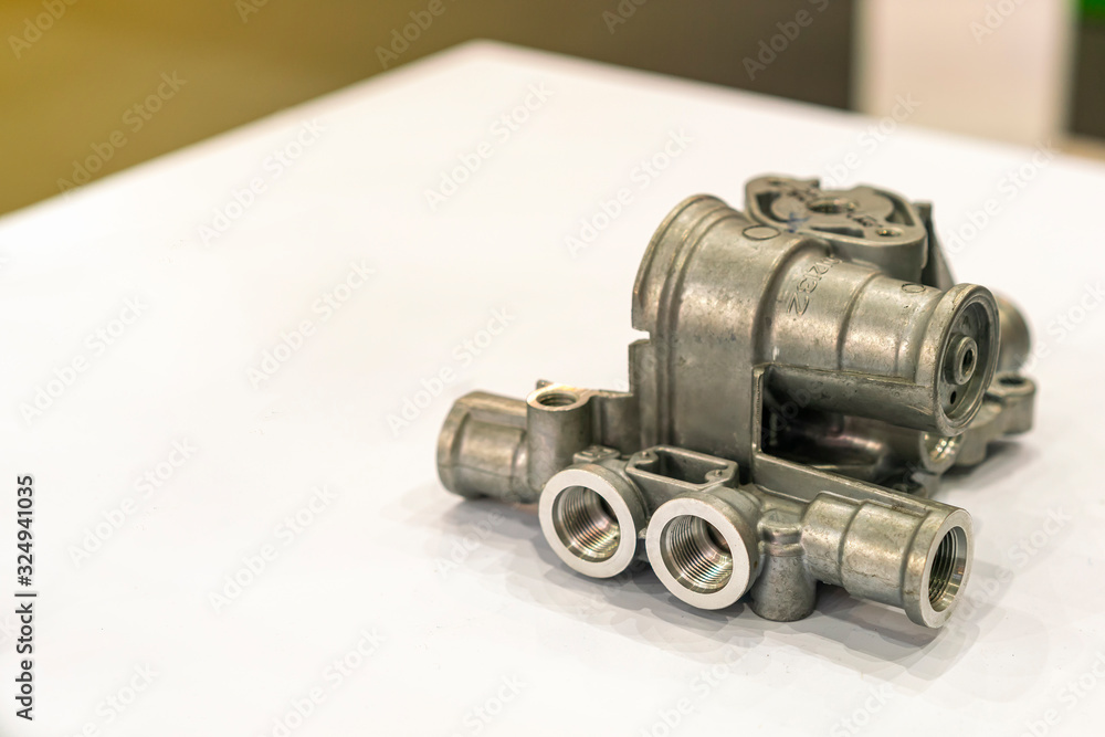 aluminum or alloy engine or pump for automobile part from high pressure die casting manufacturing process on table aluminum or alloy engine or pump for automobile part from high pressure die casting manufacturing process on table