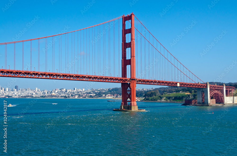 The Golden Gate Bridge in San Francisco with beautiful ocean in background The Golden Gate Bridge in San Francisco with beautiful ocean in background
