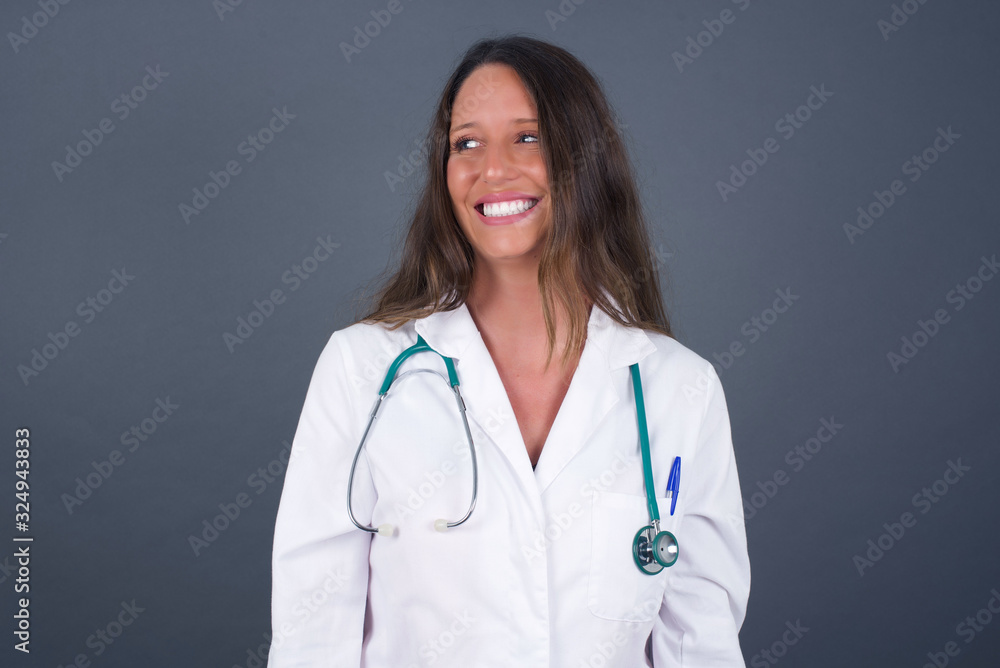 Oops! Portrait of female with specific appearance clenches teeth and looks confusedly aside, realises her bad mistake, poses against copy area for your advertising or promotional background. Oops! Portrait of female with specific appearance clenches teeth and looks confusedly aside, realises her bad mistake, poses against copy area for your advertising or promotional background.