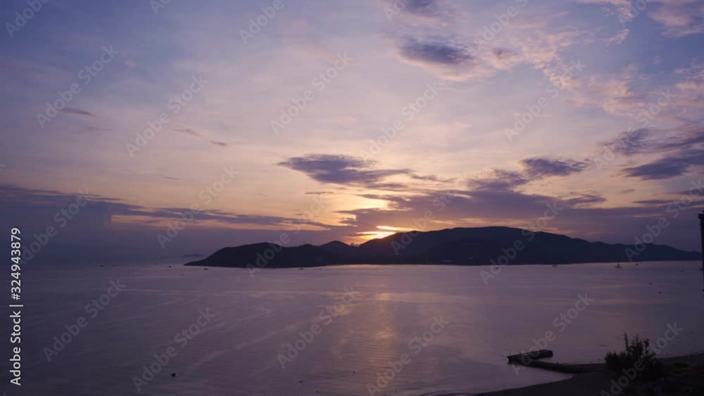 the sun rises from behind the mountains. dawn. sea view. timelapse the sun rises from behind the mountains. dawn. sea view. timelapse