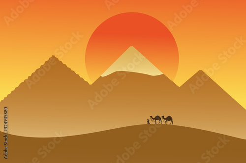 Obraz na plátně Caravan in desert on background of pyramids and sun