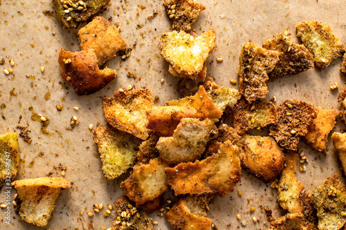 Close up view of zaatar flavored pita chips on wooden surface photo