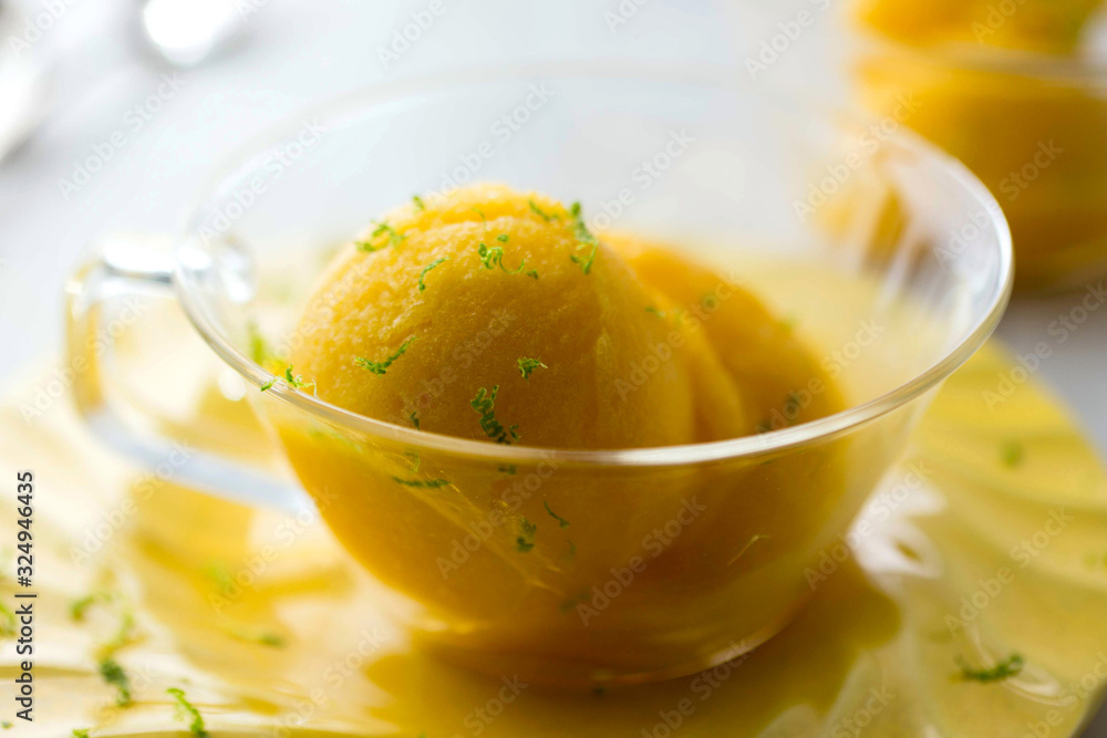 Close up view of mango sorbet served in bowl Close up view of mango sorbet served in bowl