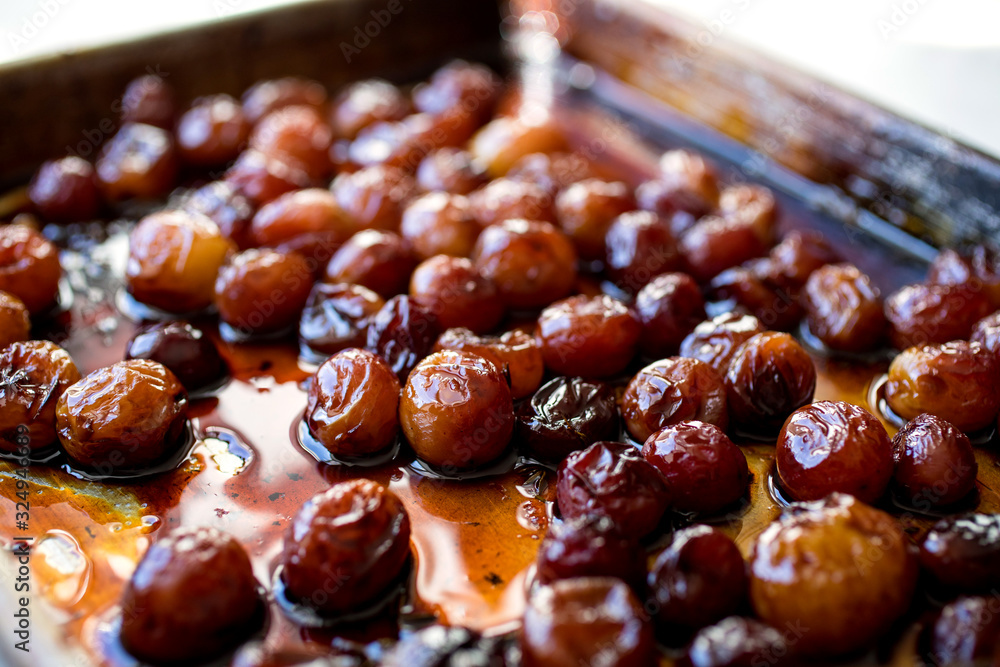 Close up view of roasted grapes Close up view of roasted grapes