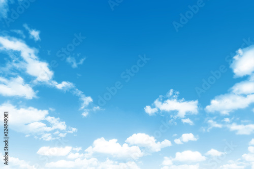 blue sky with white clouds background natural color top perspective up view. Design mockup with copy space. Nature landscape wallpaper. Abstract flat backdrop