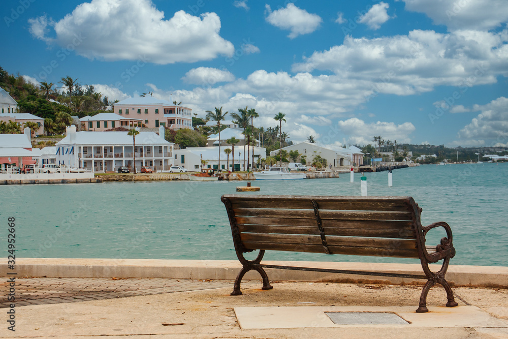 An empty bench looking out a a bay on Bermuda