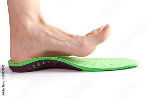 female foot and orthopedic insole