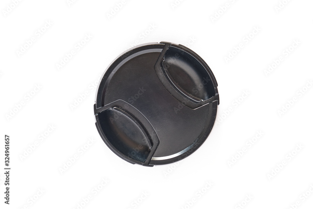 Black photo lens cap isolated on white background - top down view.